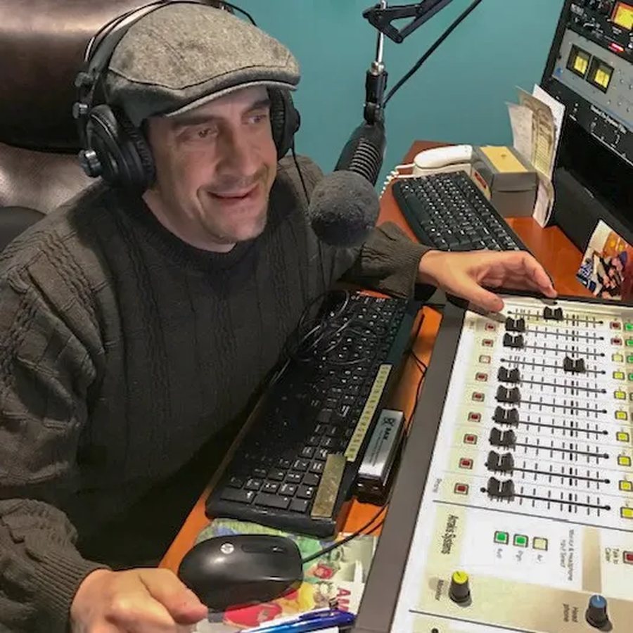 Mike Greenberg on the air in his studio